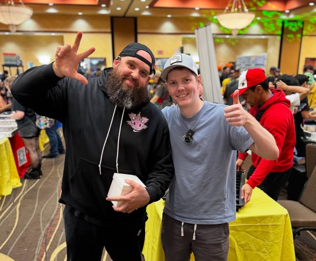 Coop and Beard Dad at a trading card convention
